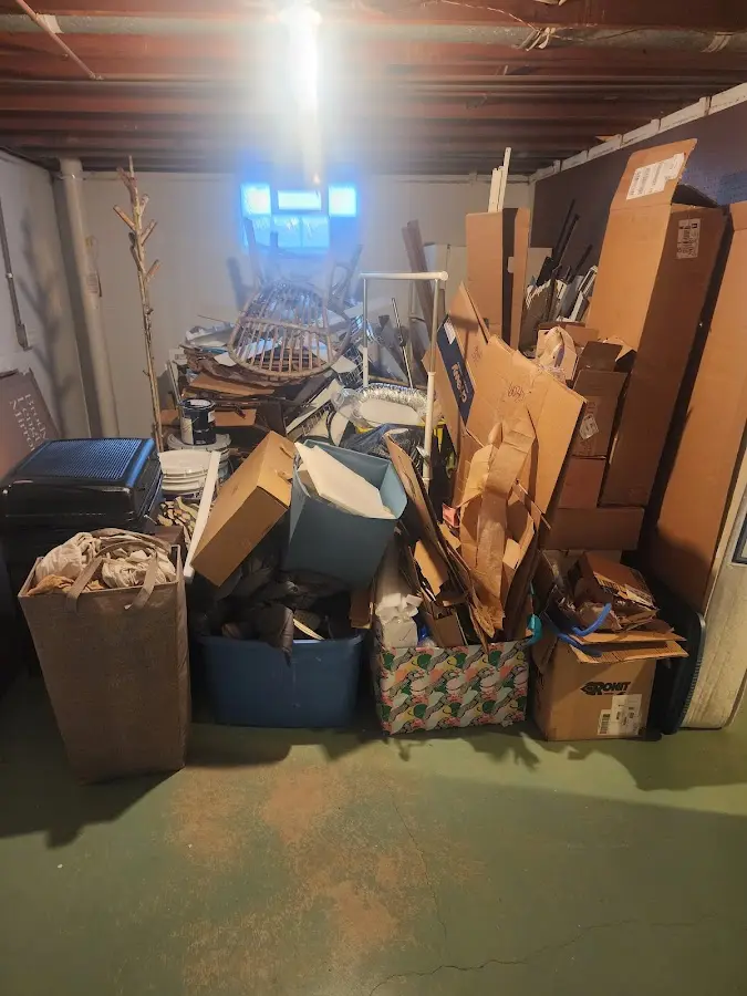 Roll-off dumpster container at job site for Yard Waste Dumpster Rental in Menands